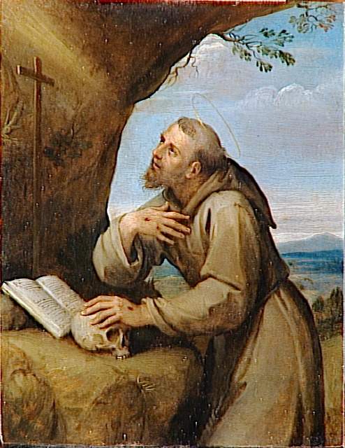 Saint Fran�ois d'Assise en oraison devant un crucifix